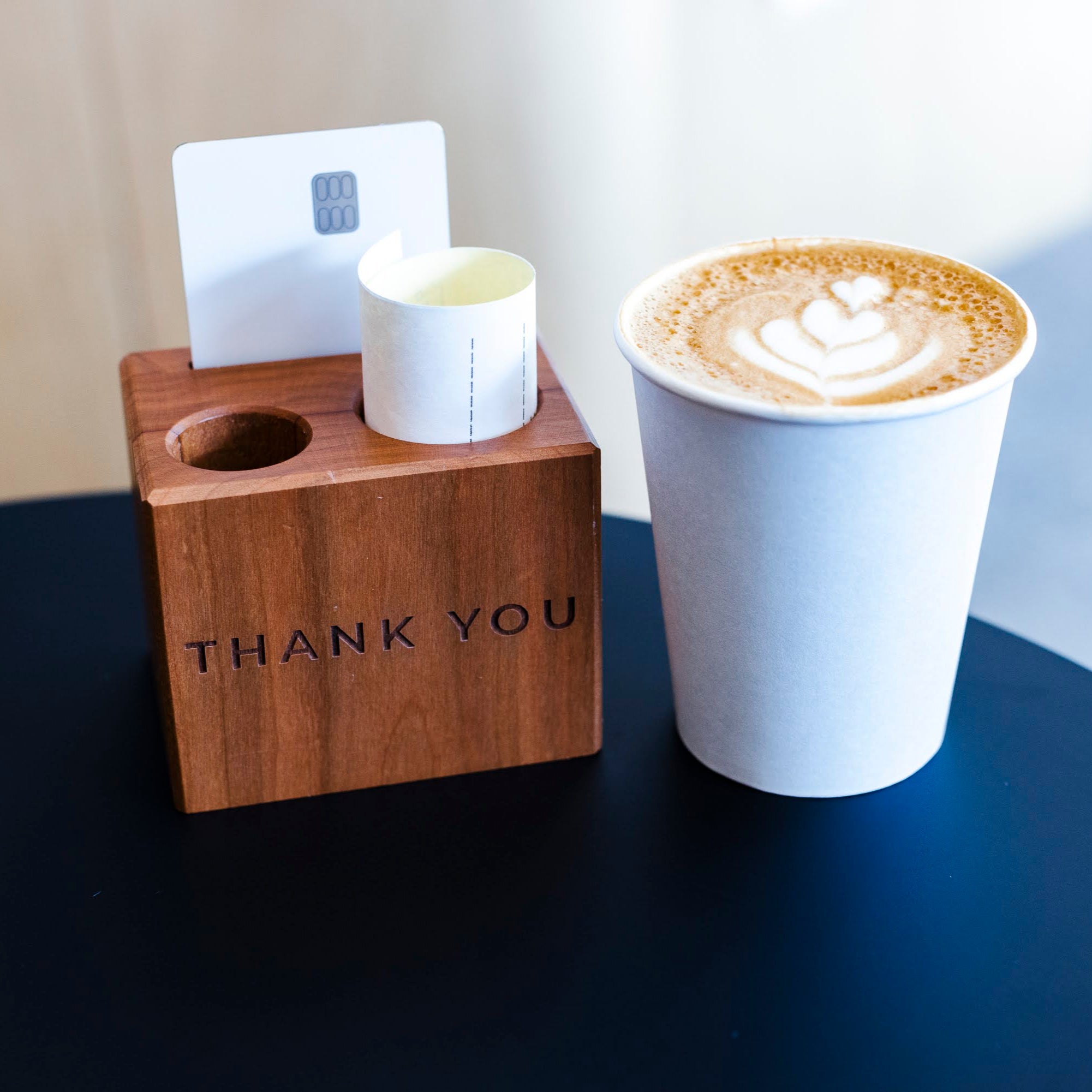 woodblock check presenter with "thank you" laser engraved.